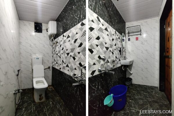 Modern bathroom featuring a toilet, washbasin, and decorative tiles, available for a stay near Pawna Lake.